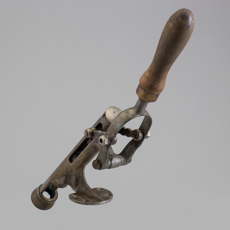 A circa 1900 wine bottle opener.