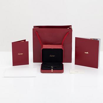 Cartier, Armband "Trinity", 18K vitguld och keramik, textilrem. Märkt Cartier, JZY979.