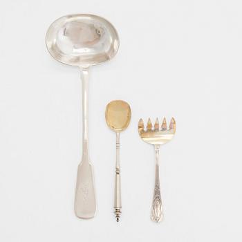 A silver soup ladle, fork and caviar spoon, St. Petersburg 19th century 1860 - early 20th century. The fork by Grachev.