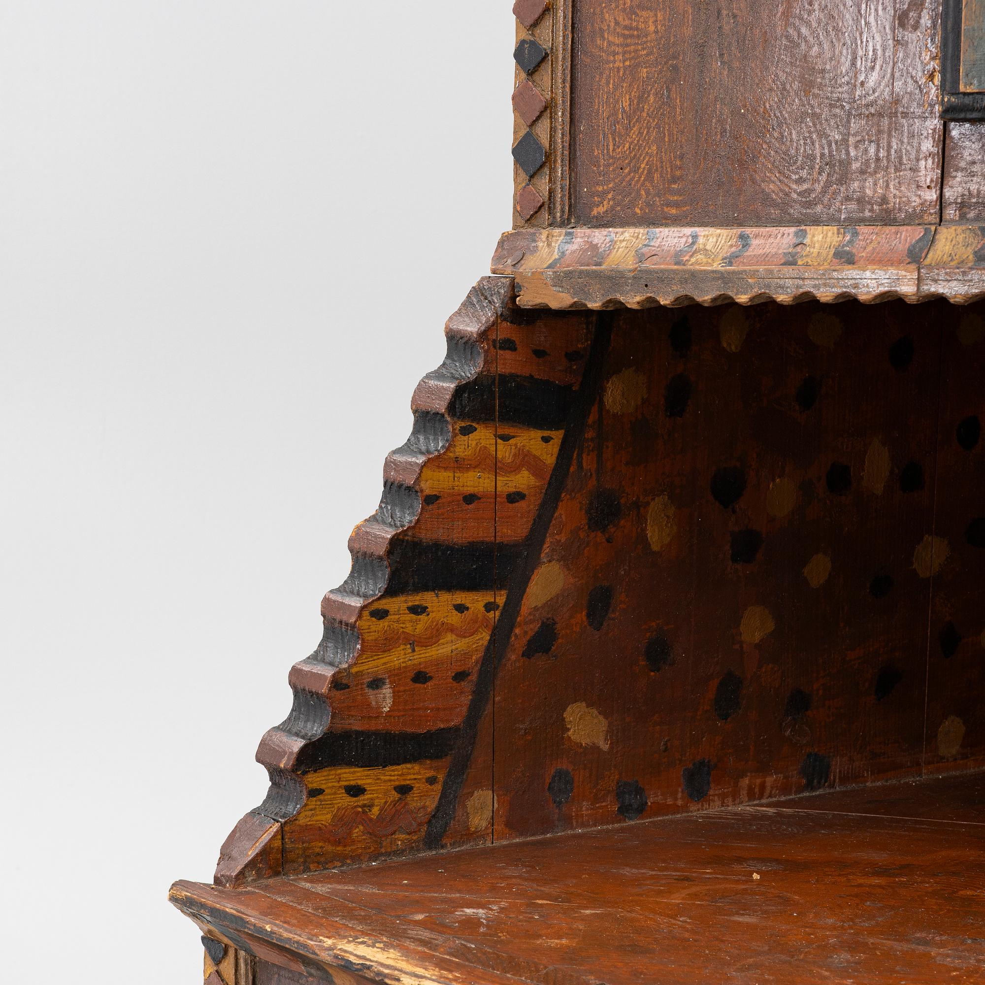 A corner cupboard, probably Värmland, dated 1822.