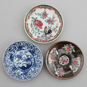 A famille rose butter tureen with cover and two cups with three odd stands, Qing dynasty, Qianlong (1736-95).