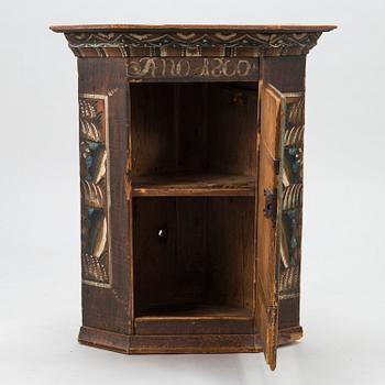 A Swedish corner cabinet from Dalarna, dated "Anno 1800".