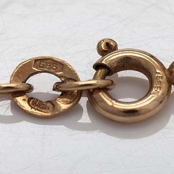 Kaulakoru, 14K kultaa, cabochonhiottu kuukvartsi ja ametisti. Suomalaiset leimat.