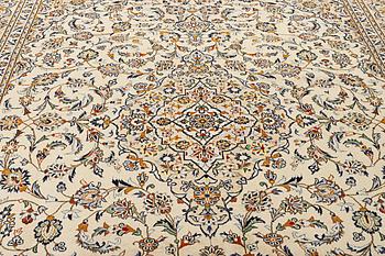A Kashan carpet, c. 388 x 285 cm.