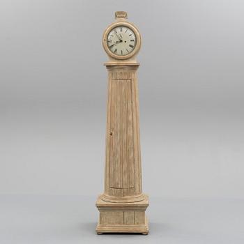 A circa 1800 long case clock.