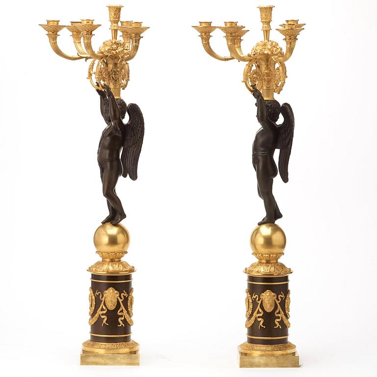 A large pair of French Chibout circa 1820 gilt and patinated bronze six-light candelabra.