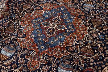 A Kashmar rug, c. 396 x 300 cm.