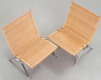 Poul Kjaerholm, a pair of 'PK-22' steel and rattan easy chairs by E Kold Christensen, Denmark.