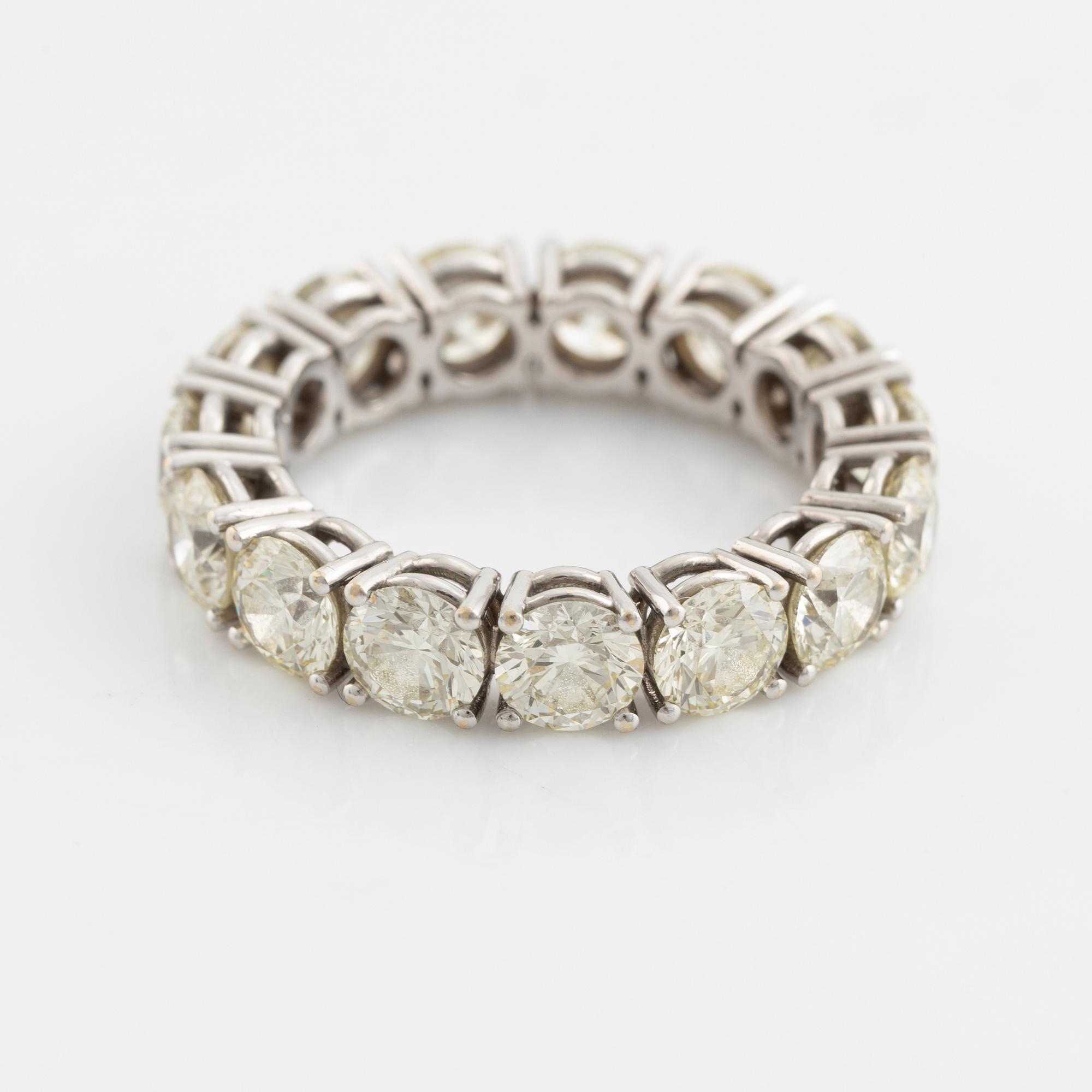 Brilliant cut diamond eternity ring.
