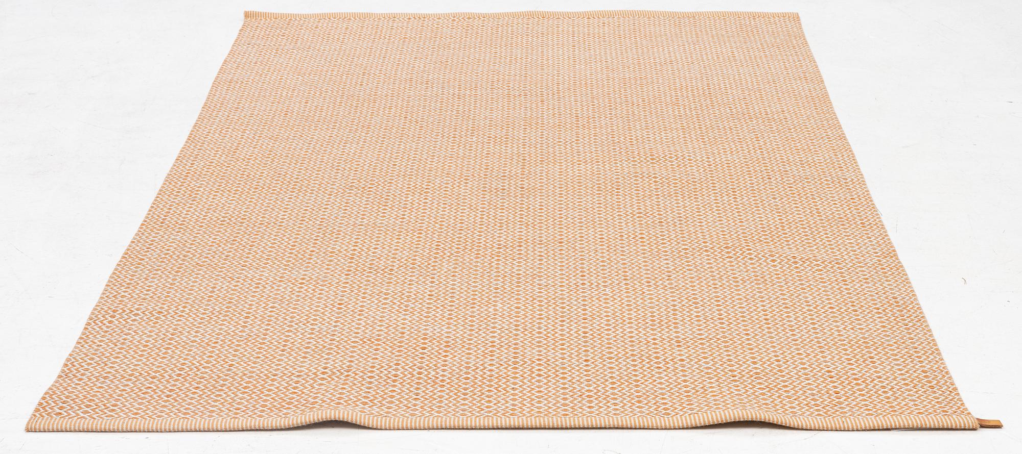A flat weave "Ingrid" carpet, Kasthall, c. 242 x 158 cm.