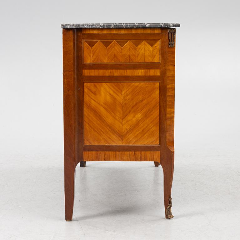 A Louis XVI style chest of drawers, France, circa 1900.
