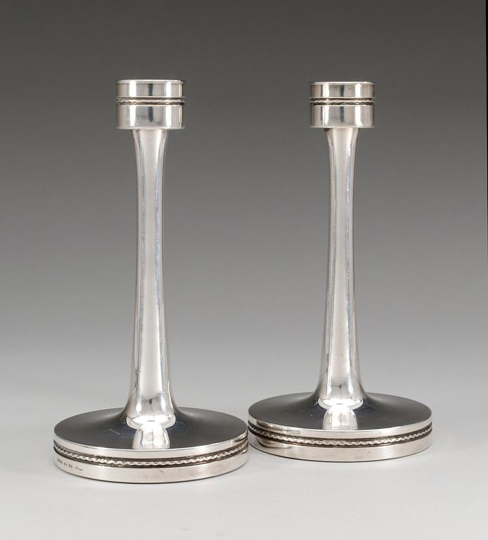 LJUSSTAKAR, ett par. silver. K.G.Markströms, Uppsala 1975. Eric Löfman.