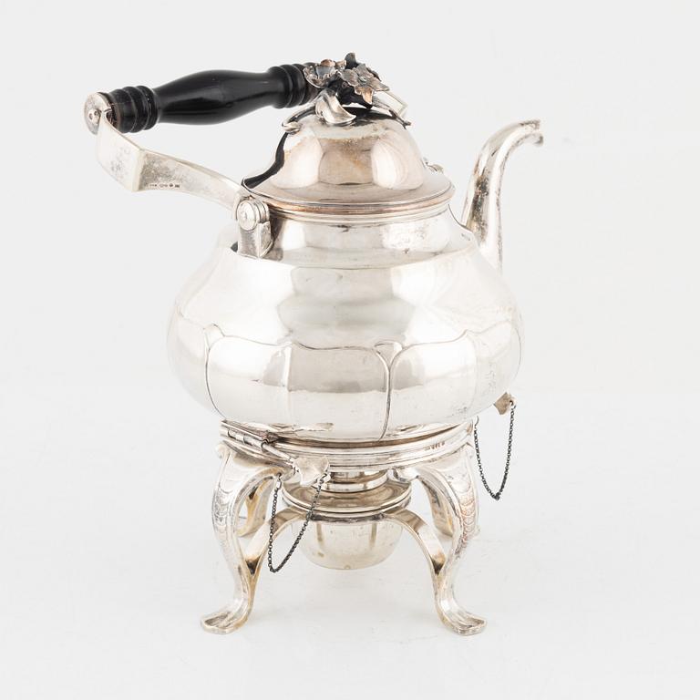 A Swedish 20th century silver tea-urn with stand and burner, marks of Guldsmedsaktiebolaget (GAB), Stockholm 1920.