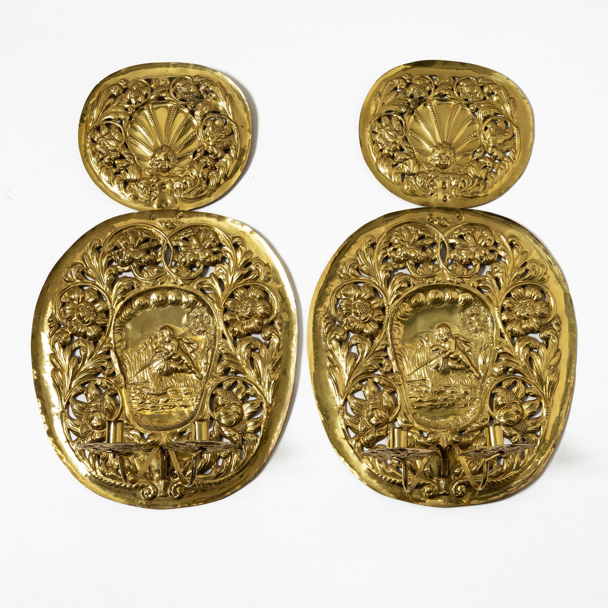 A pair of  Swedish Baroque style brass light plates, Johan F Hellström, Nyköping around the year 1900.