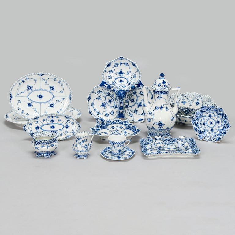 A 39-piece porcelain coffee set, 'Musselmalet', mostly full lace, Royal Copenhagen, Denmark.