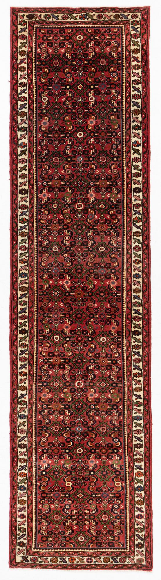 A Hosenabad runner, approximately 322 x 81 cm.