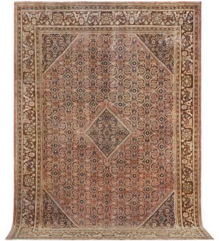 An oriental, vintage design carpet, c. 317 x 216 cm.