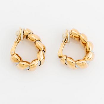 A pair of 18K gold and steel Bulgari earrings.