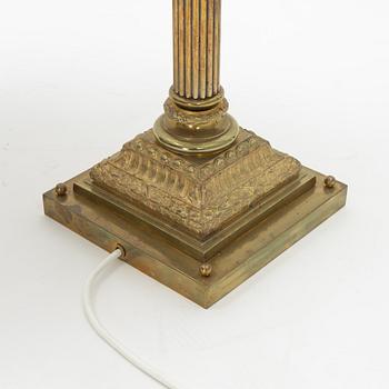 A pair of brass Empire style table lamps, 20th Century.