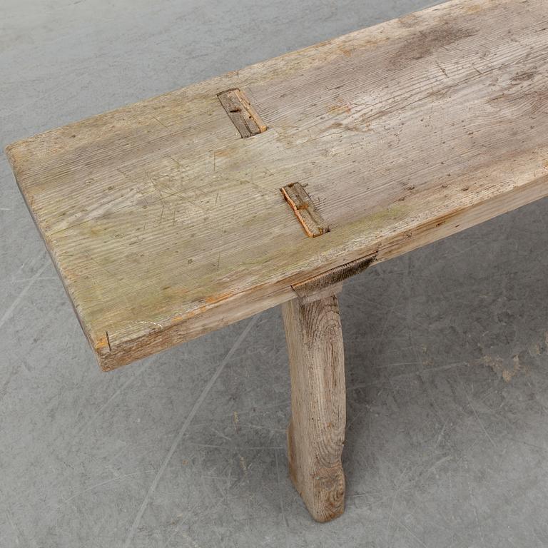 a 19th century pine bench.