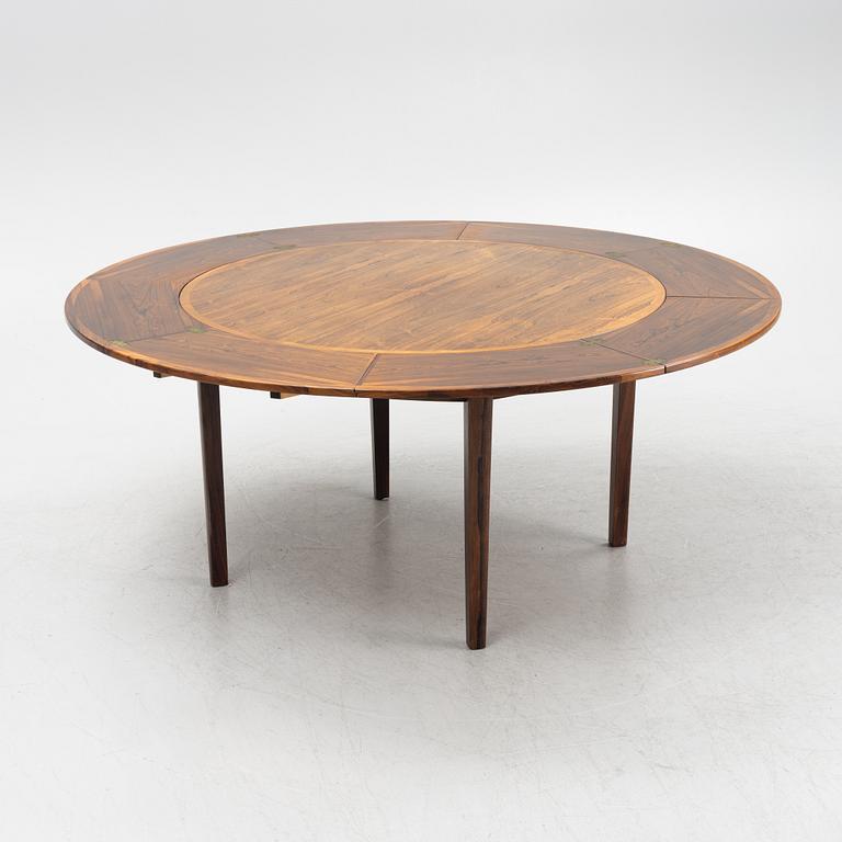 A rosewood veneered 'Flip-Flap' dining table, Dyrlund & Smith, Denmark, 1960's.