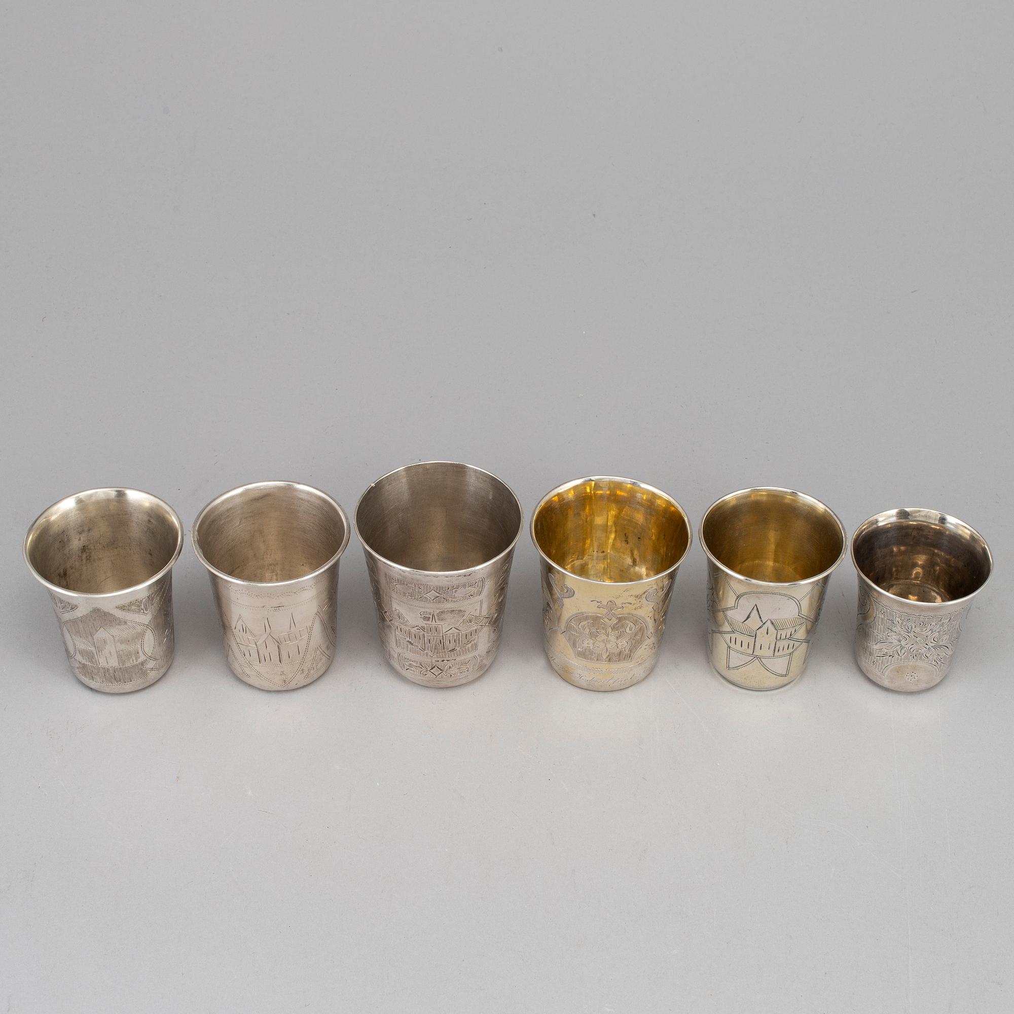 A set of six Russian 19th century parcel-gilt silver vodka cups.