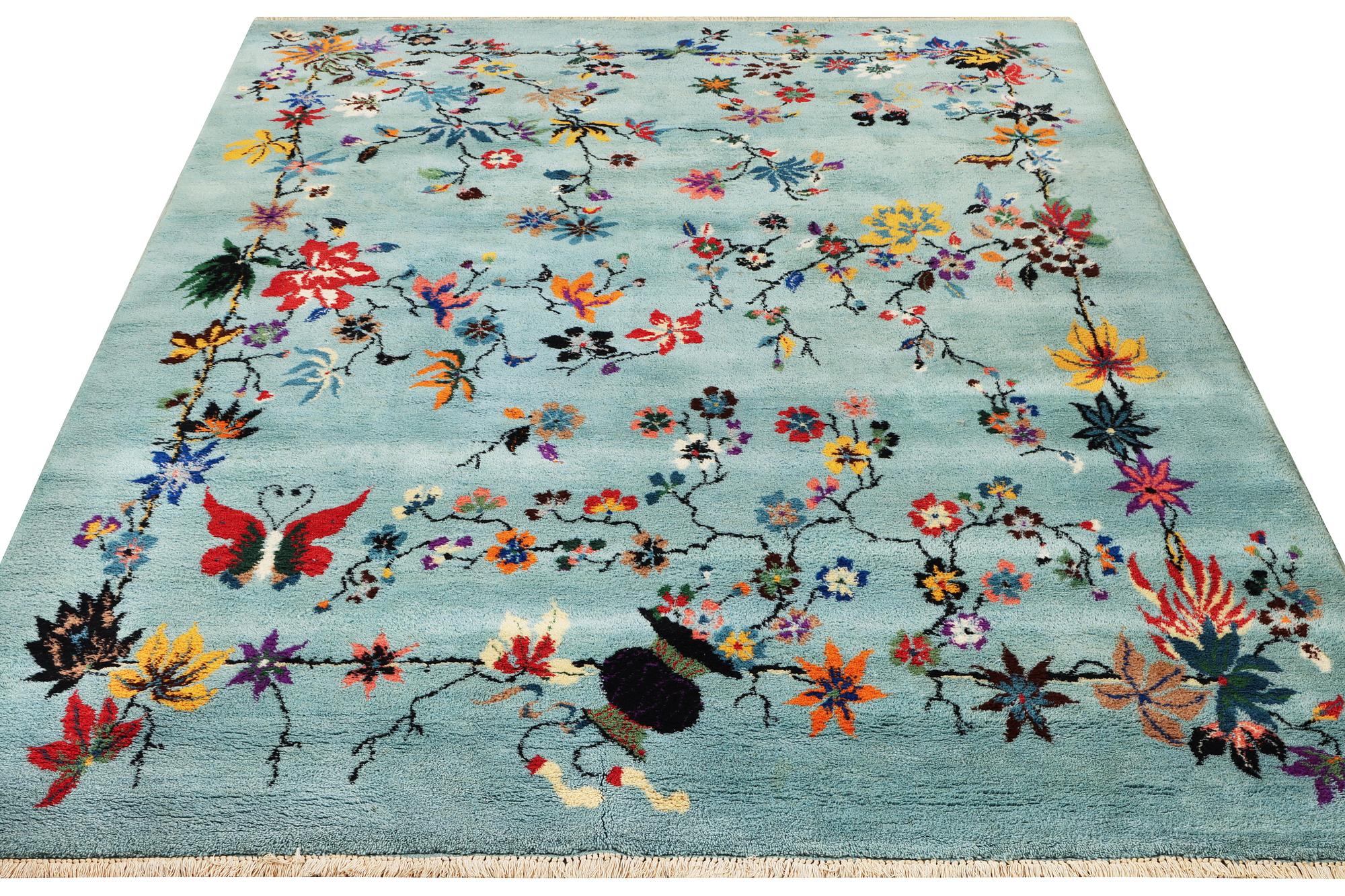 An oriental carpet, a. 370 x 261 cm.