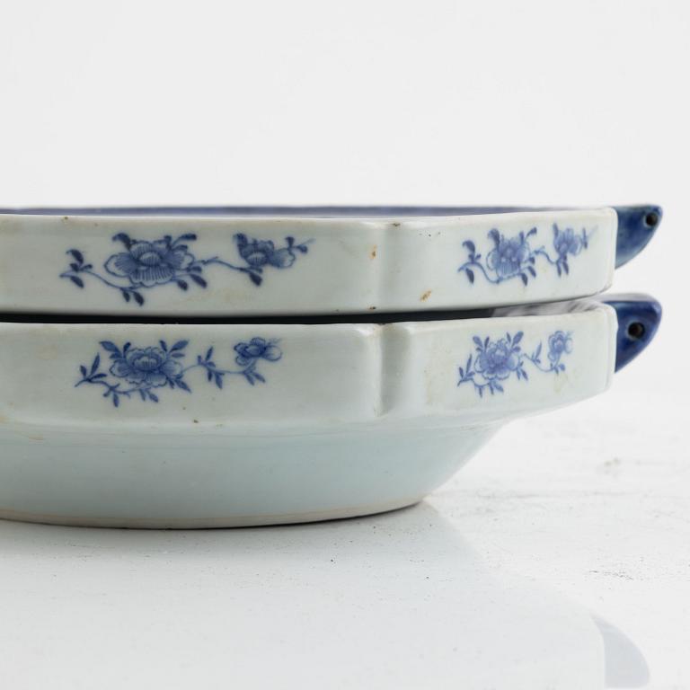 A pair of blue and white porcelain hot water plates, China, Qianlong (1736-95).