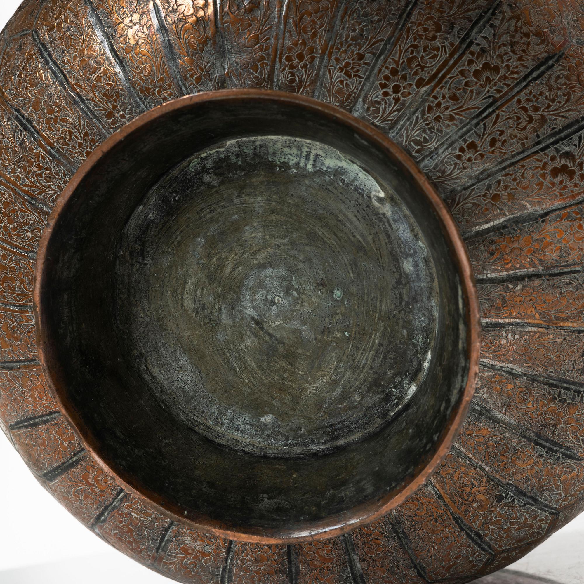 A large Persian copper bowl, late Qajar dynasty / early 1900s.