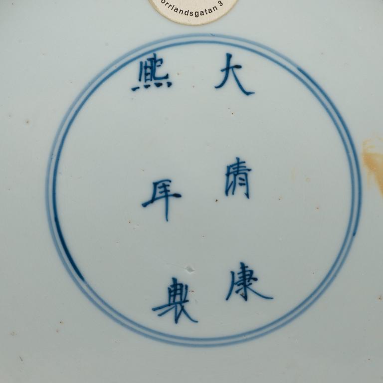 A blue and white dish, Qing dynasty, with Kangxis six character mark and period (1662-1722).