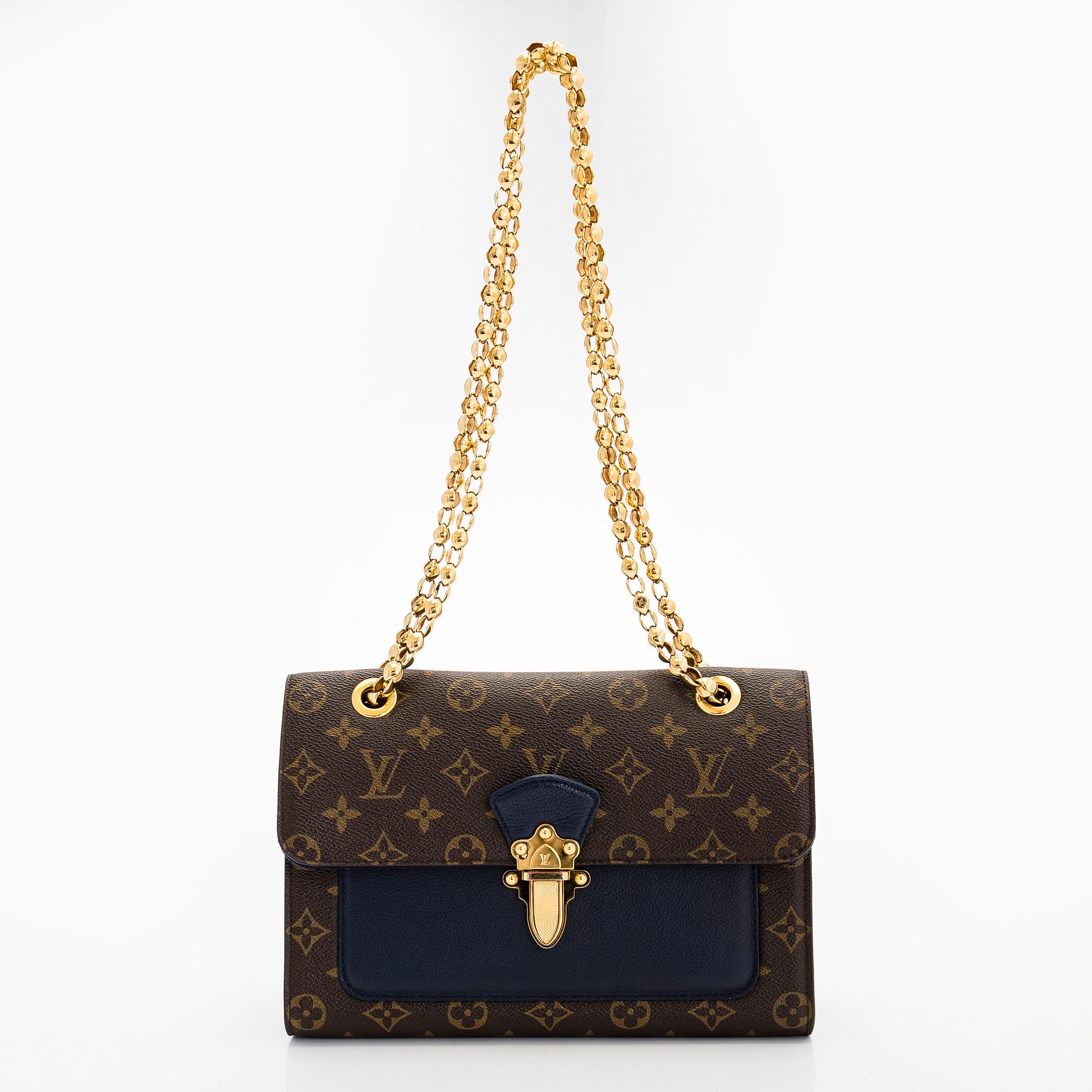 Louis Vuitton, a Monogram 'Victoire' bag.
