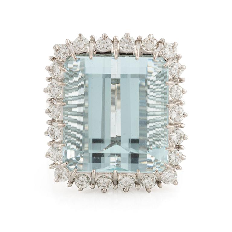 An 18K white gold Engelbert ring set with a aquamarine and round brilliant-cut diamonds.