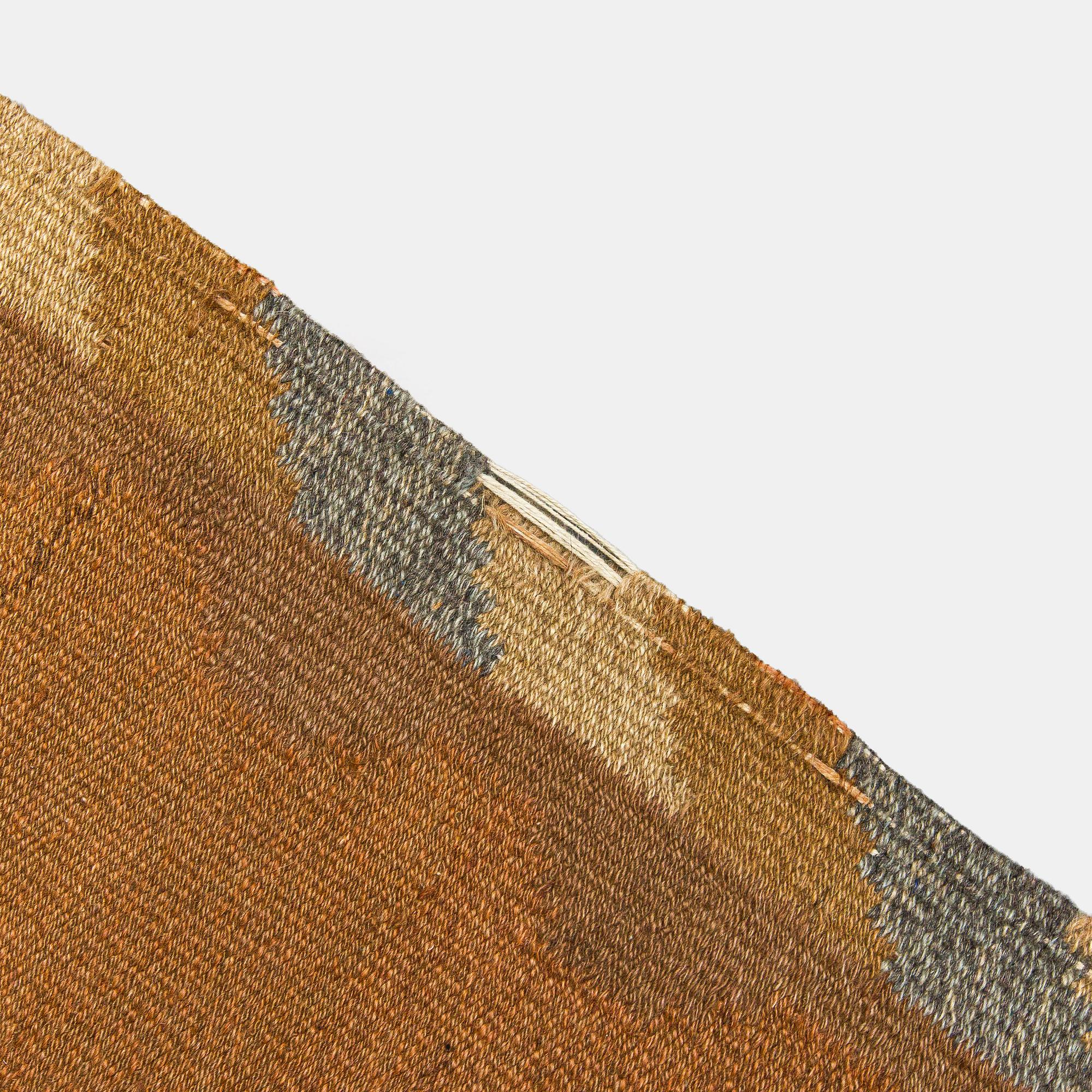 Aino Keinänen-Baeckmann, A 1920s Finnish flat weave carpet. Circa 300 x 203 cm.