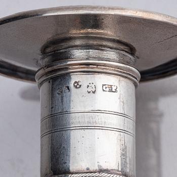 A pair of Swedish silver candlesticks, marks of Gustaf Folcker, Stockholm 1825.