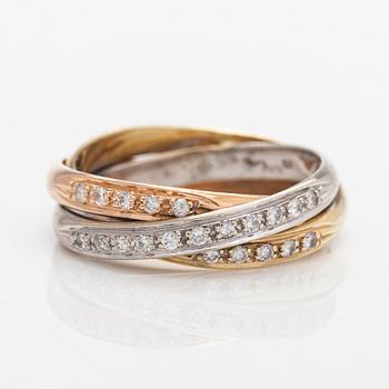 A 14K three-colour goldring, diamonds totalling approximately 0.21 ct. Finnish import marks 1995.