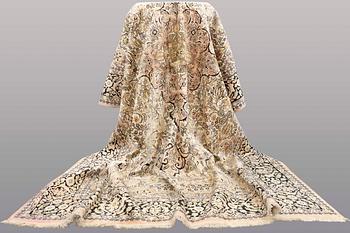 A CARPET, old silk Kashmir, ca 380 x 274 cm.