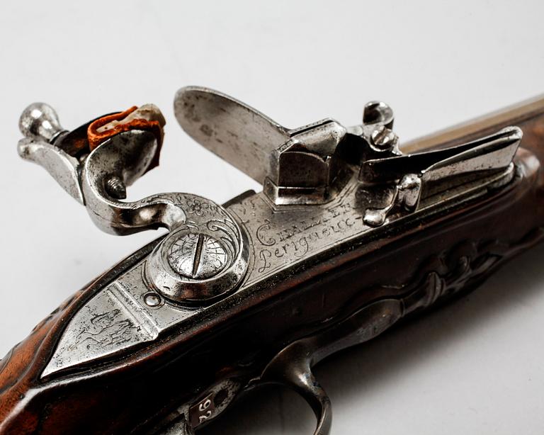 A flintlock gun, probably 18th century.