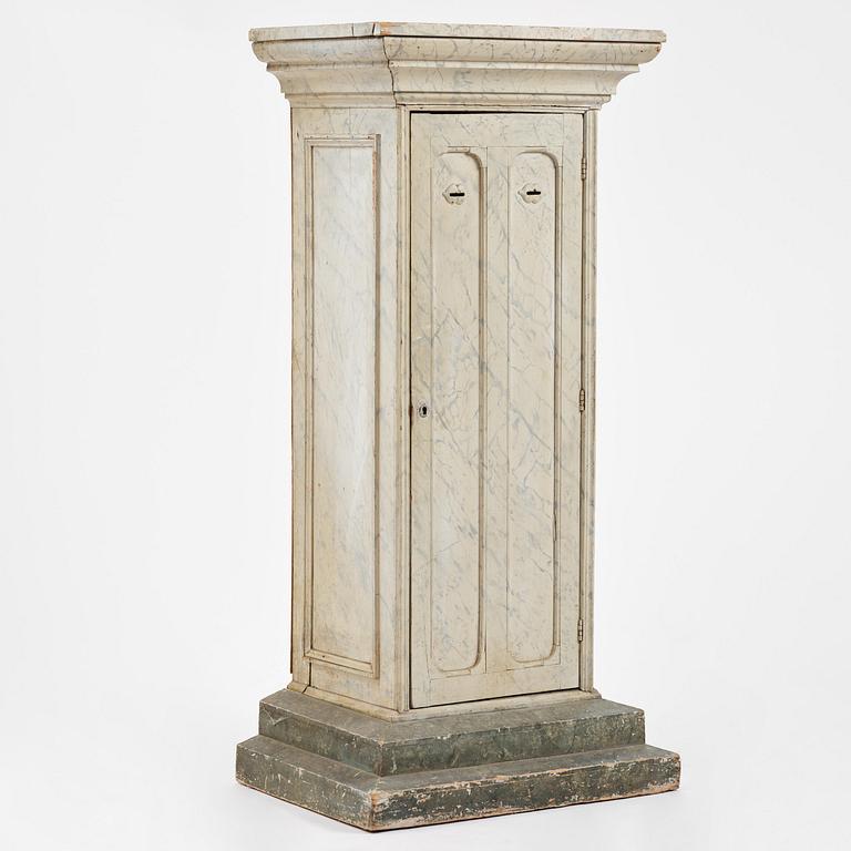 A Swedish column-shaped cabinet 19 th century.