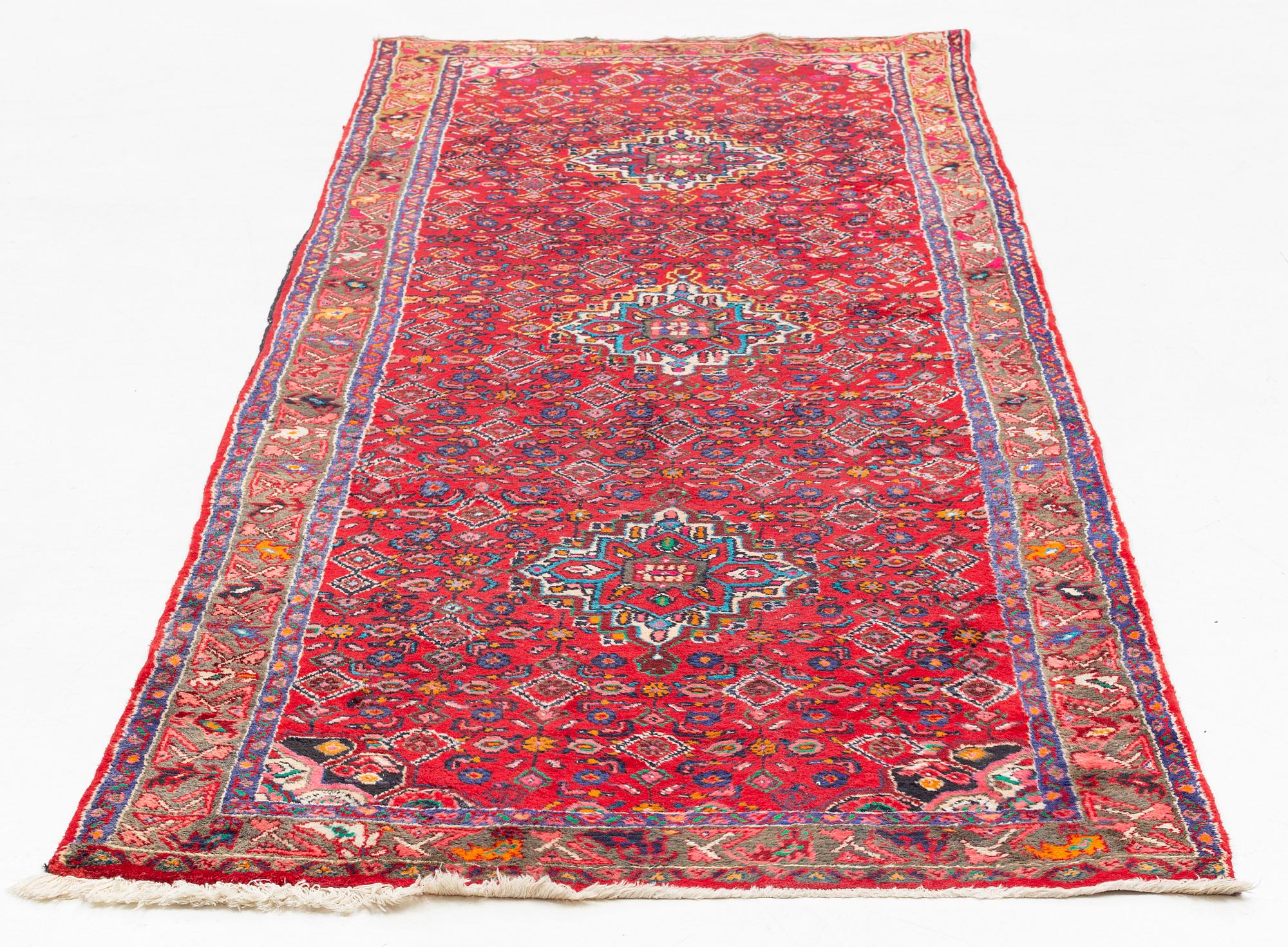 Rug, Hosseinabad, circa 310 x 112 cm.
