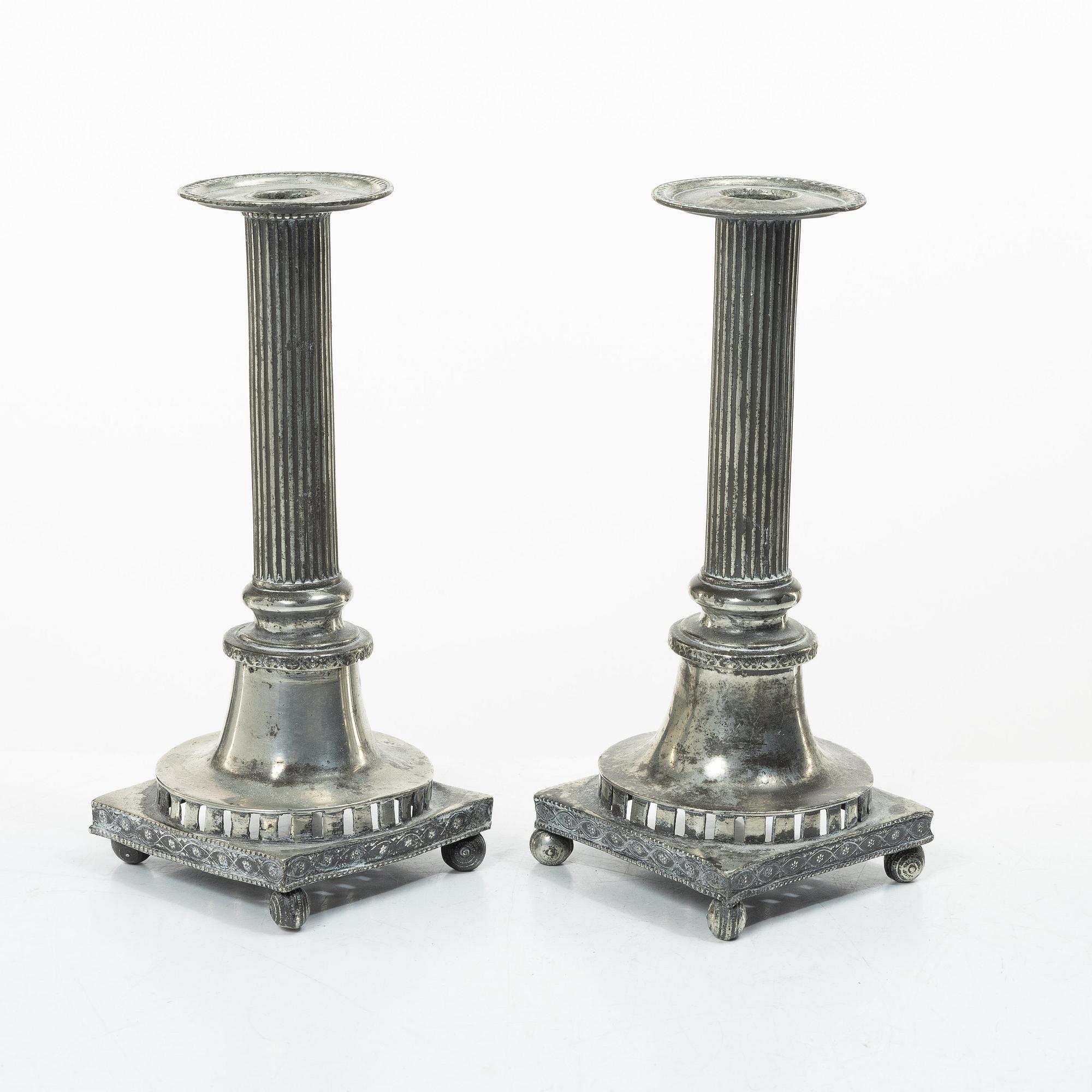 A pair of peuter candlesticks by Hans Wicksten (active between 1782-1810), Västerås.