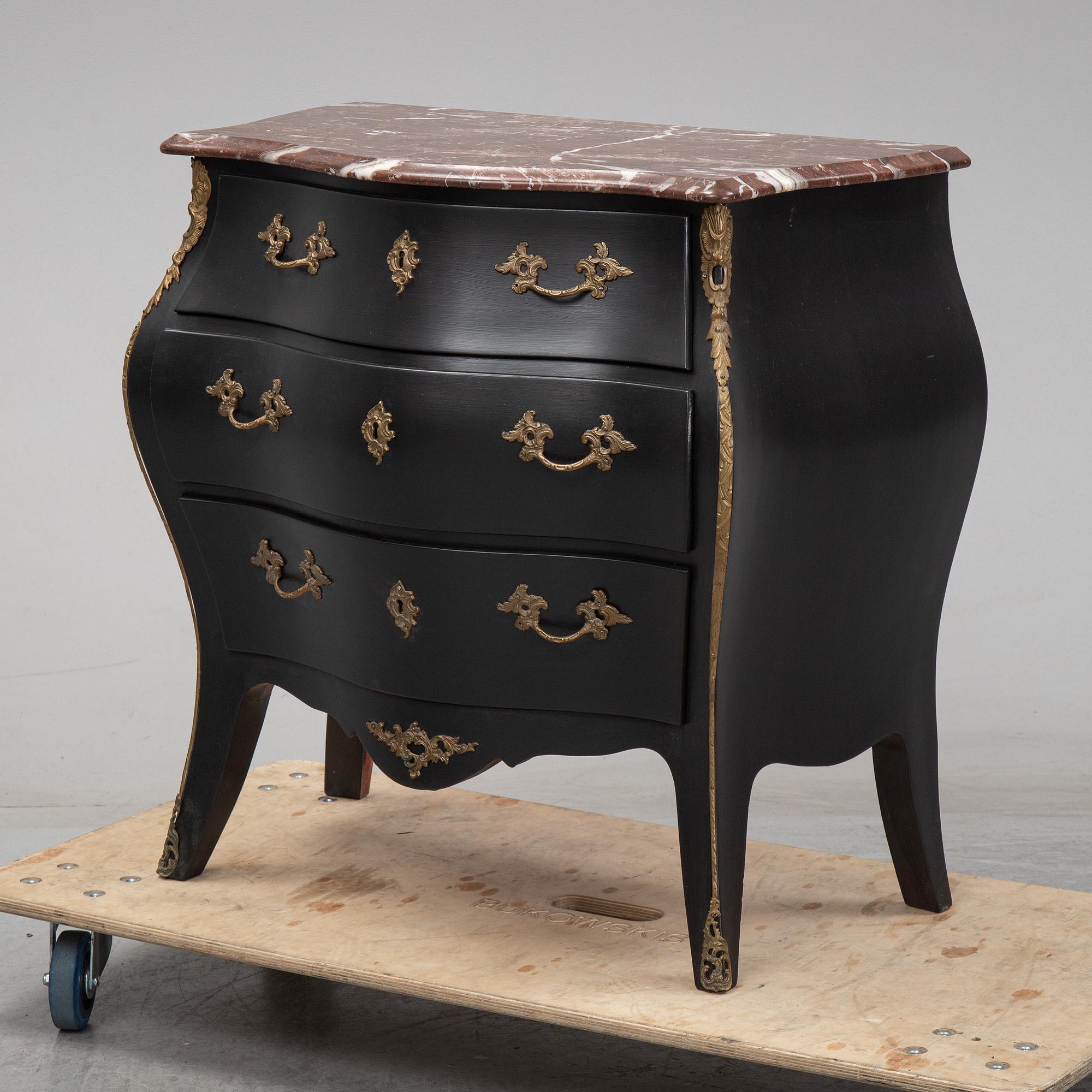 A mid 20th Century rococo style chest of drawers.