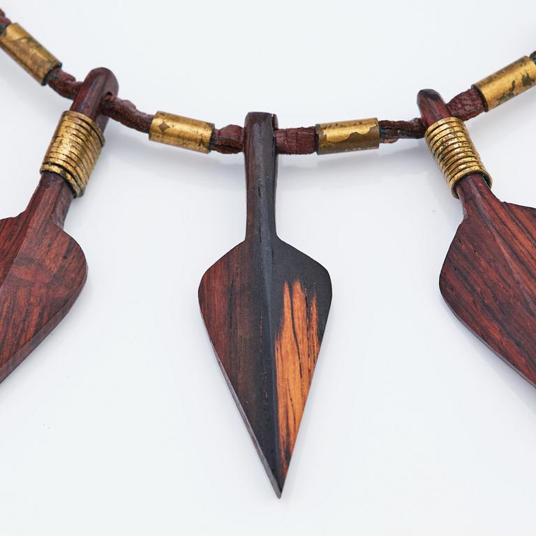 Vivianna Torun Bülow-Hübe, a leather, wood and brass necklace, executed in her own studio, Stockholm ca 1950.
