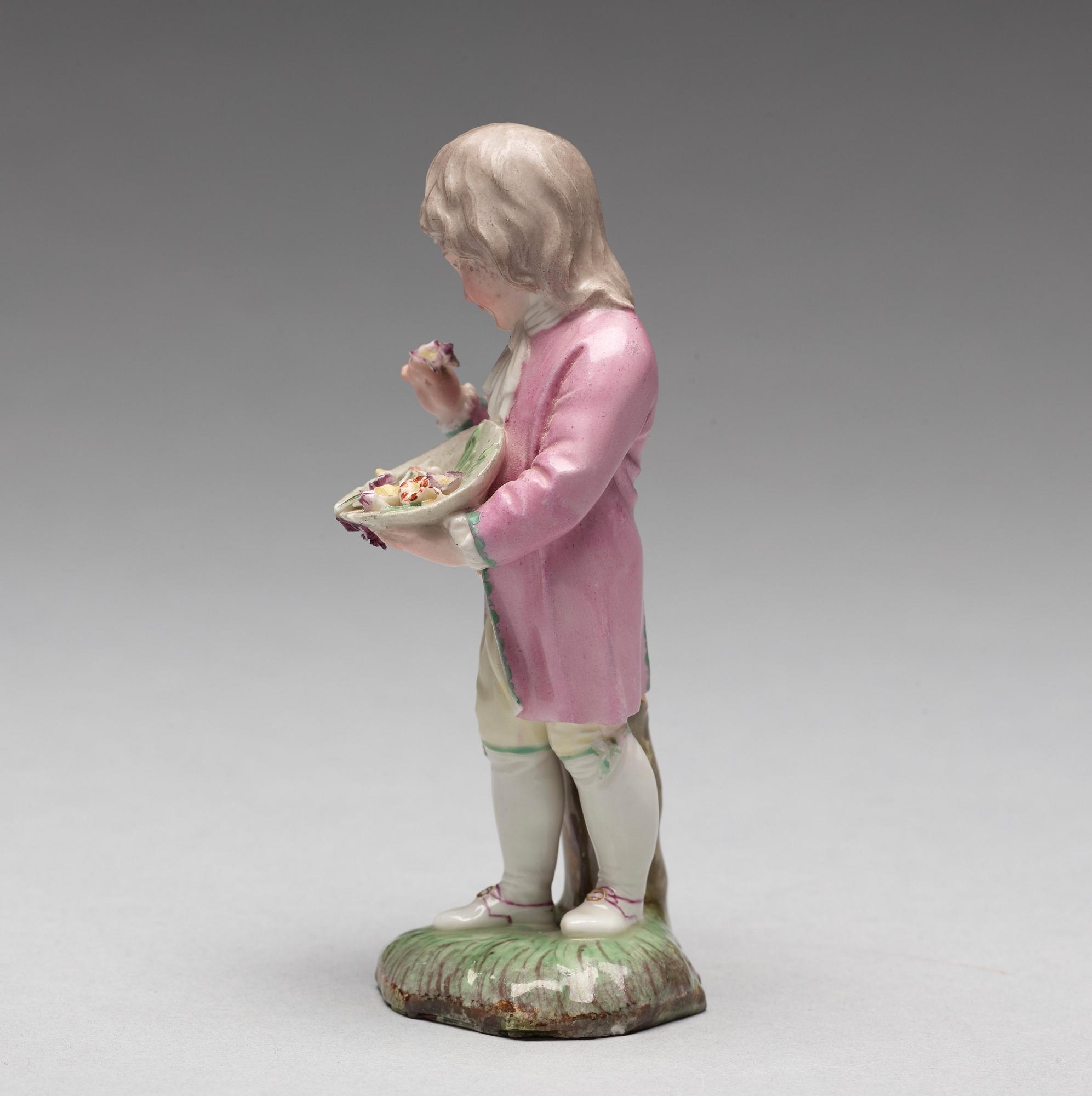 A Höchst porcelain figure of a boy, 1770's.