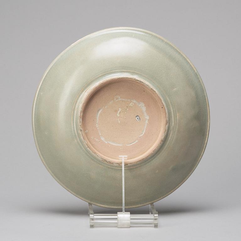 A celadon glazed dish, Thailand, Sawankhalok, 16/17th Century.