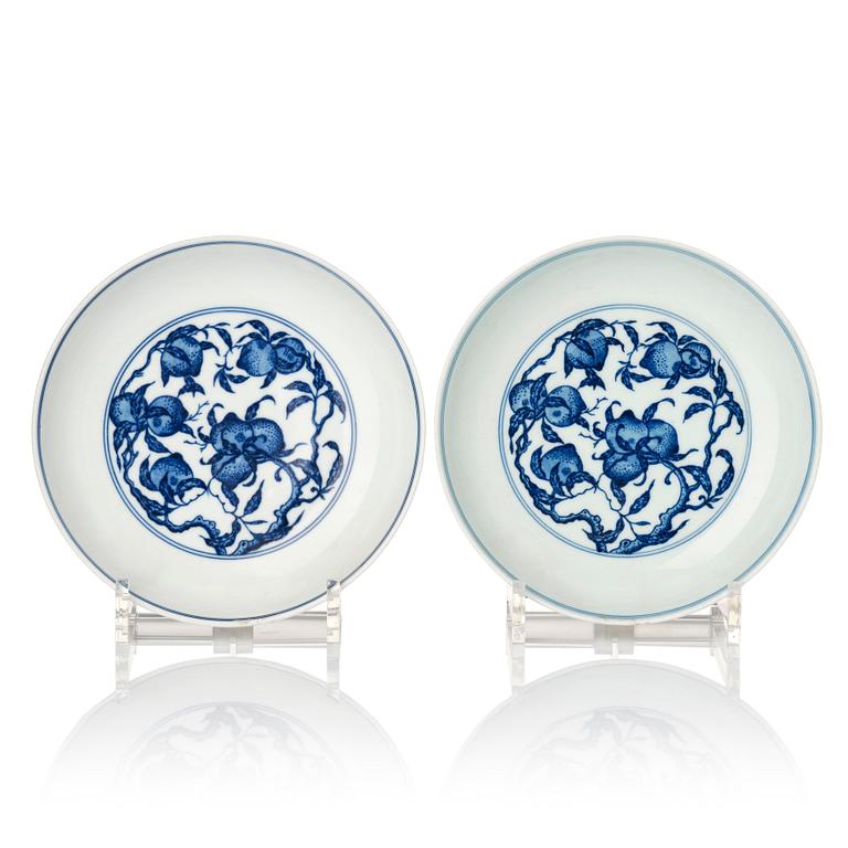 A pair of blue and white nine peaches dishes, China, presumably Republic, with Yongzheng mark.