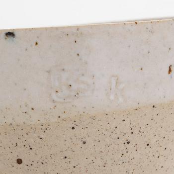 Kyllikki Salmenhaara, a stoneware tea strainer signed KS.