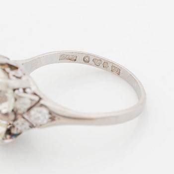 A platinum ring set with an old-cut diamond.