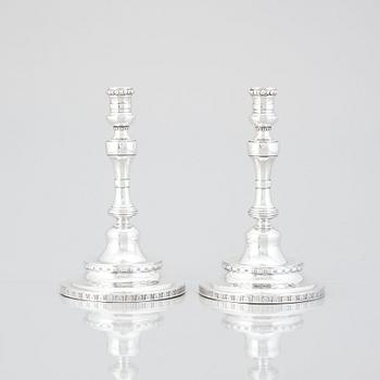 A pair of Swedish Rococo silver candlesticks, mark of Pehr Zethelius, Stockholm 1775.