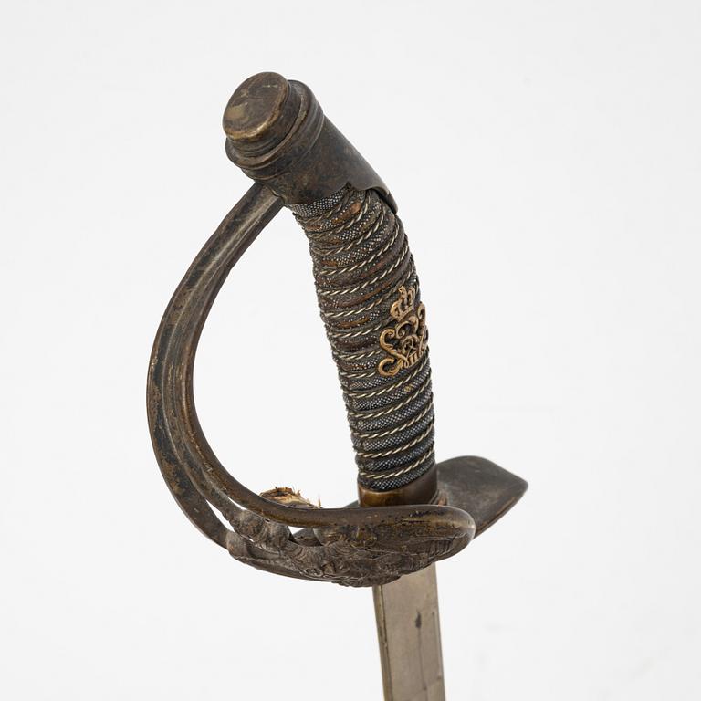 A 1889 pattern Prussian infantery officer's sabre with scabbard.