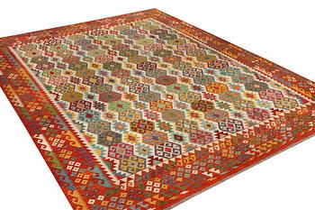 A Kilim carpet, . 405 x 313 cm.